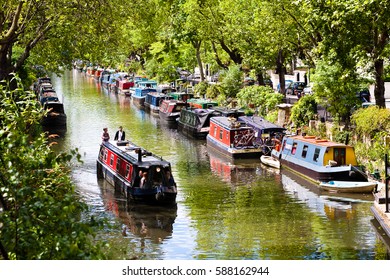 London, England. May 25, 2014. Tourists Strolling By Boat In Little Venice, Regent's Canal, London, England