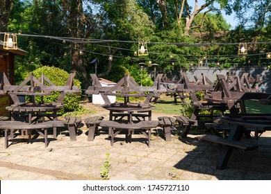 LONDON, ENGLAND - MAY 31, 2020: Beer Garden Of A Traditional British Pub On A Summer's Day Closed With All The Tables Stacked Away Due To Coronavirus COVID-19 Pandemic Lockdown - 1