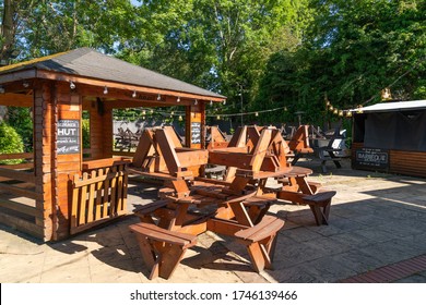 LONDON, ENGLAND - MAY 31, 2020: Beer Garden Of A Traditional British Pub On A Summer's Day Closed With All The Tables Stacked Away Due To Coronavirus COVID-19 Pandemic Lockdown - 2