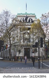 LONDON, ENGLAND - NOVEMBER 14, 2019: People Crossing The (Aldwych) Street In Front Of Australia House In London, England