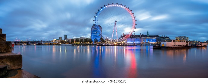 LONDON, ENGLAND - NOVEMBER, 2015. Panorama Of The London Eye In French Flag Colors At Dawn