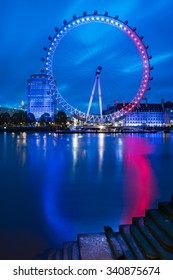 LONDON, ENGLAND - NOVEMBER, 2015, View Of The London Eye With French Flag Colors At Sunrise - London Tribute To Paris Attacks