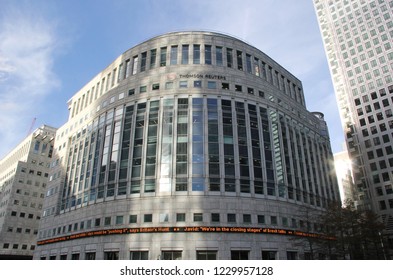 London, England - November 2018; Thomson Reuters building headquarters at Canary Wharf or Isle of Dogs on Canada Square. Canadian multinational mass media and information firm. BREXIT news headlines