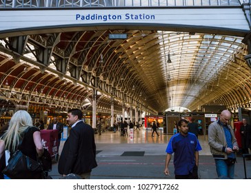 London, England - October 25 2017 : People at the entrance to Paddington Station, one of London's busiest and most important rail transport hubs. LONDON, October 25 2017