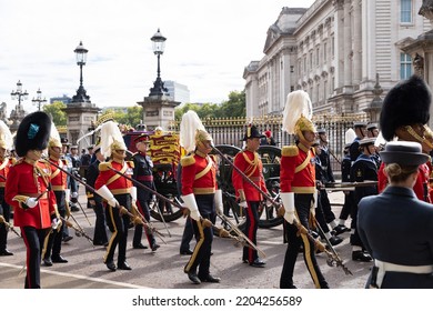 LONDON, ENGLAND - SEPTEMBER 19, 2022: Top British Military Officers Escort A Gun Carriage Bearing The Coffin Of Queen Elizabeth II Past Buckingham Palace On Her Funeral Day Journey To Windsor Castle. 