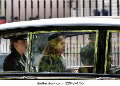 LONDON, ENGLAND - SEPTEMBER 19, 2022: Princess Beatrice Of York Sheds A Tear As She Passes Buckingham Palace With Her Sister Princess Eugenie Of York In The Funeral Cortege Of Queen Elizabeth II.
