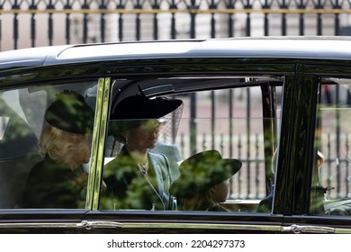 LONDON, ENGLAND - SEPTEMBER 19, 2022: Queen Consort, Camilla Passes Buckingham Palace On Queen Elizabeth II's Funeral Day, With Catherine, Princess Of Wales, And Prince George And Princess Charlotte