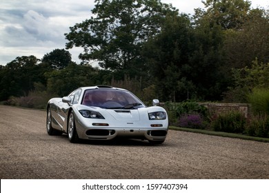 London, England - September 2019: silver McLaren F1 classic supercar arriving to an annual Concours of Elegance event held at Hampton Court Palace in London.