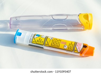 London, England - September 29, 2018: Epinephrine Autoinjector Or Epipen Is A Medical Device For Injecting Doses Of Epinephrine Or Adrenaline Through A Needle Into A Patient Suffering An Allergy. 