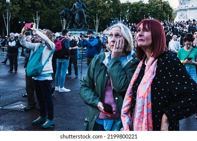 London, England - September 8 2022: As News Of The Queen's Death Reaches The Crowd, Grief Sets In For Some As Others Record The Events On Smartphones.