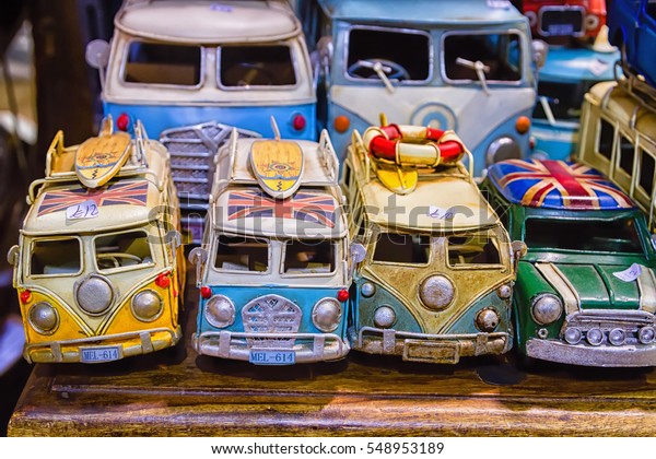 LONDON, ENGLAND -\
SEPTEMBER 9, 2016: Miniature VW T2 at the Camden Town market. The\
cult car of the Hippie generation and it remained the status\
vehicle of the high wave\
surfers