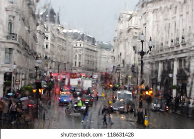 London, England - Street Scene In The Rain