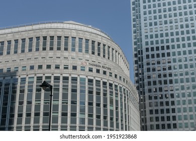 London, England, UK - 08 April 2021: Thomson Reuters building in Canary Wharf, one of the business districts of London, during a sunny day. 