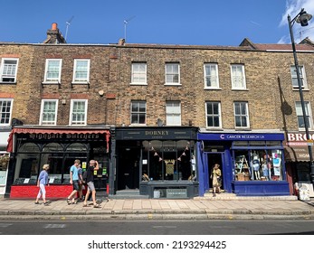 London, England, UK - 20.08.2022. Street View Of Highgate High Street. Fragment Of Facade Of Local Small Shops. North Of London. A View Down Characterful Highgate High Street. Victorian And Georgian