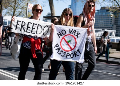 London, England, UK - April 24, 2021: Protesters hold signs at "Unite For Freedom" Protest Against Vaccine Passports Held In London Credit: Loredana Sangiuliano