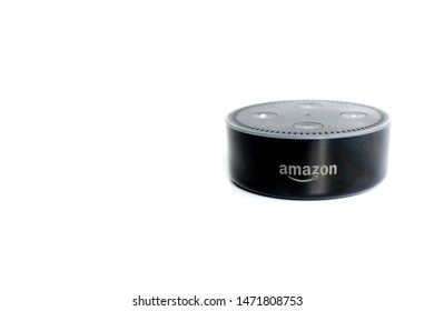 London, England, UK - Aug 2019: Amazon's Echo Dot (Alexa) Smart Speaker Enabled With Artificial Intelligence Isolated On White Background With Copyspace