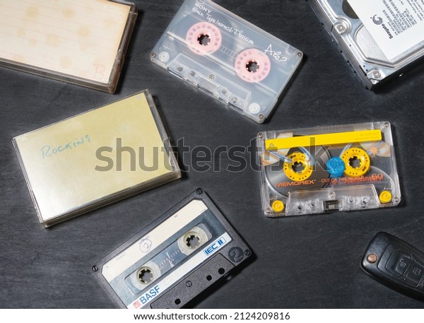 London, England, Uk.\
February, 16th, 2021. Top down shot of Old school cassettes, key\
and hard drive.