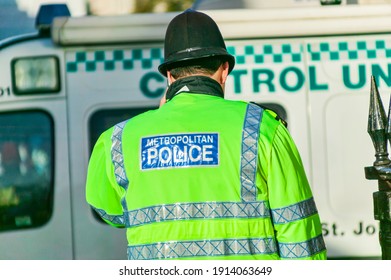 London, England, UK, January 1, 2010 : Back View Of A Metropolitan Police Officer On Duty In The City Of London England UK Stock Photo Image