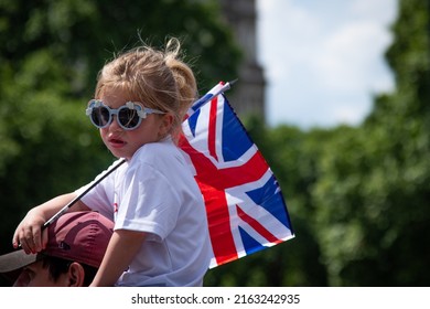 London, England, UK - June 2, 2022: A Child Holds The British Flag During The Queen Elizabeth II Platinum Jubilee 2022 - Trooping The Colour. Credit: Loredana Sangiuliano