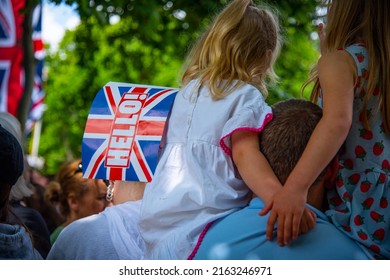 London, England, UK - June 2, 2022: Young Fans View The Parade, Holding A Hello! Flag During The Queen Elizabeth II Platinum Jubilee 2022 - Trooping The Colour. Credit: Loredana Sangiuliano