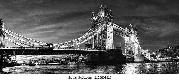 London  England  UK: Night view the Tower Bridge over river Thames in black   white