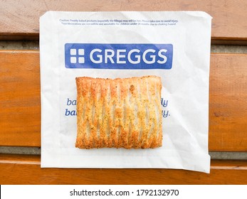 London, England, UK - November 11, 2019: Greggs Baked Chicken And Mushroom Slice On A Branded Greggs Paper Bag