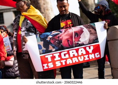 London, England, UK - October 19, 2021: Protesters hold signs and flags at the Tigray Genocide Protest outside 10 Downing Street. Credit: Loredana Sangiuliano