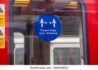 London England UK, October 22 2021, London Tube Train Close-Up Of Covid-19 Coronavirus Keep Apart Sign Or Social Distancing Door Stickers