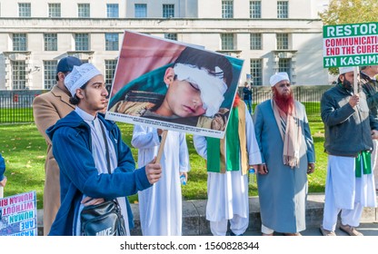 London, England, UK - October 27,  2019:  “ A Photograph Of 4 Year Boy Eye Was Badly Damaged By Indian Army”  March Outside 10 Downing Street,London, England, UK 