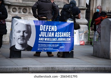London, England, UK - October 28, 2021: A banner is displayed at the Free Assange Protest at the Royal Courts of Justice. Credit: Loredana Sangiuliano