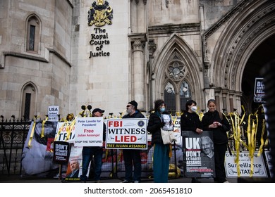 London, England, UK - October 28, 2021: Activists hold signs at the Free Assange Protest at the Royal Courts of Justice. Credit: Loredana Sangiuliano