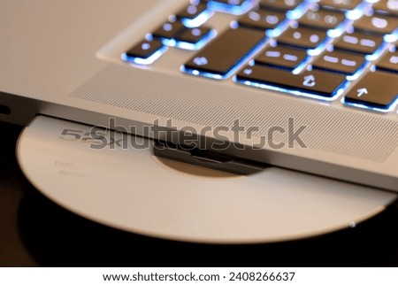 london, england-January 04 th 2024: computer hardware, keyboards, USB flash drives and CDs