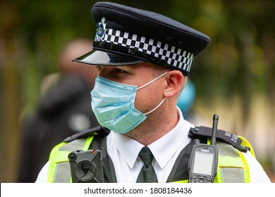 London, England/uk - August 30th 2020: Police Officer Wearing PpE And Face Mask During Black Live Matter Protest From Nottinghill To Hyde Park