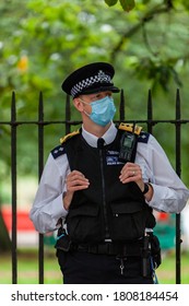 London, England/uk - August 30th 2020: Police Officer Wearing PpE And Face Mask During Black Live Matter Protest From Nottinghill To Hyde Park