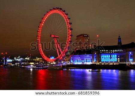 London Eye in night lights | long exposure photo, popular tourist attraction. England, United Kingdom, Europe