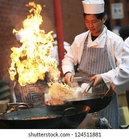 LONDON - FEB 18 : Chinese Chefs Working At Chinese New Year Celebrations In London's Chinatown On Feb18, 2007, London, UK. Various Traditional Performance Attract Thousands Of People To The Street.