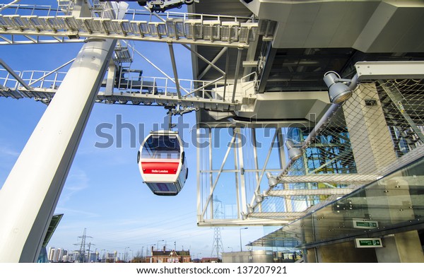 LONDON - FEB 23: Emirates Air Line cable cars,\
December 7, 2012 in London. The service is the UK\'s first urban\
cable car running across the\
Thames