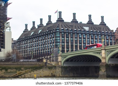 London, Great Britain April 12 2019: Portcullis House. 1 Parliament St, Westminster, London. Westminster Bridge Road Dubledecker bus