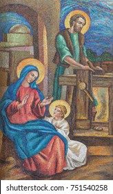 LONDON, GREAT BRITAIN - SEPTEMBER 17, 2017: The detail of the mosaic of Holy Family in St. Peter Italian church from 20. cent.