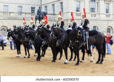 LONDON, GREAT BRITAIN - SEPTEMBER 19, 2014:  This is a detachment of equestrian royal guardsmen, built to change the guard at the Horse Guards.