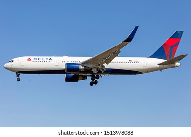 London Heathrow Airport (LHR), August 18th 2019. Delta Airlines passenger aircraft N155DL, a Boeing 767, lands at the airport in fine weather.