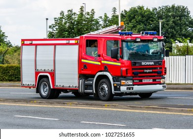 LONDON, HEATHROW / UK - 15 JULY 2014: Fire Fighting Engine Vehicle Scania Responding And Drive To The Fire