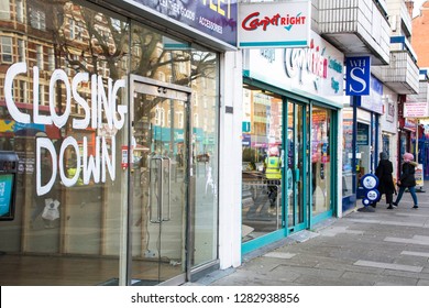 LONDON- JANUARY, 2019: A Vacant High Street Shop With 'closing Down' Sign In Shop Window
