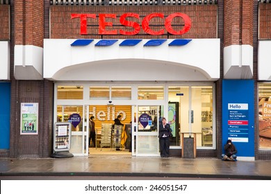 LONDON - JANUARY 21: The exterior of an Tesco's express supermarket on January the 21, 2015, in London, England, UK. Tesco's is one of the UK's leading supermarkets.