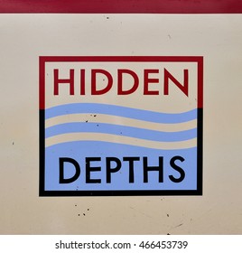 LONDON - JULY 23. 2016.. Hand Painted Lettering On A Narrow Boat Named Hidden Depths. The Company Offers Canal Cruises And Party Events Along The Regent's Canal, Located In London, UK.