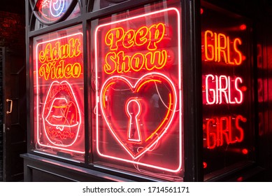 LONDON - JULY 29, 2013: Neon Sex Shop Signs In Soho District