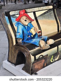 LONDON - JULY 5. Paddington Bear is a BookBench sculpture; one of 50 celebrating London's literary heritage with famous book titles on July 5, 2014 at various locations across London.