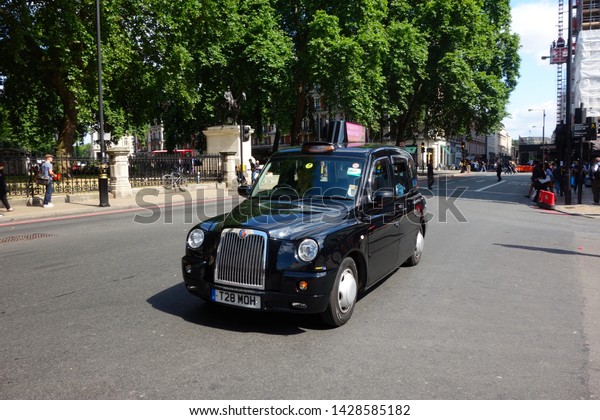 LONDON - JUNE 26 : A Taxi or\
\'Black Cab\' on June 26, 2018 in London, UK. All London cabs undergo\
a strict annual mechanical test before they are allowed to ply for\
hire 