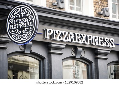 LONDON- MARCH, 2019:  Pizza Express Store Exterior Signage. A Large British Based Pizza Restaurant Group 