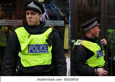 LONDON - MARCH 26: Police On Duty In Central London After Having Come Under Attack By A Breakaway Group Of Protesters During An Anti-cuts Rally On March 26, 2011 In London, UK.